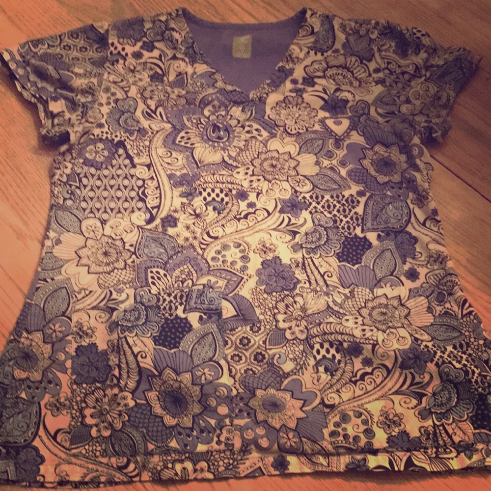 Two floral scrub tops